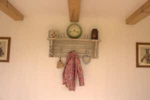 Clock and coat hanger